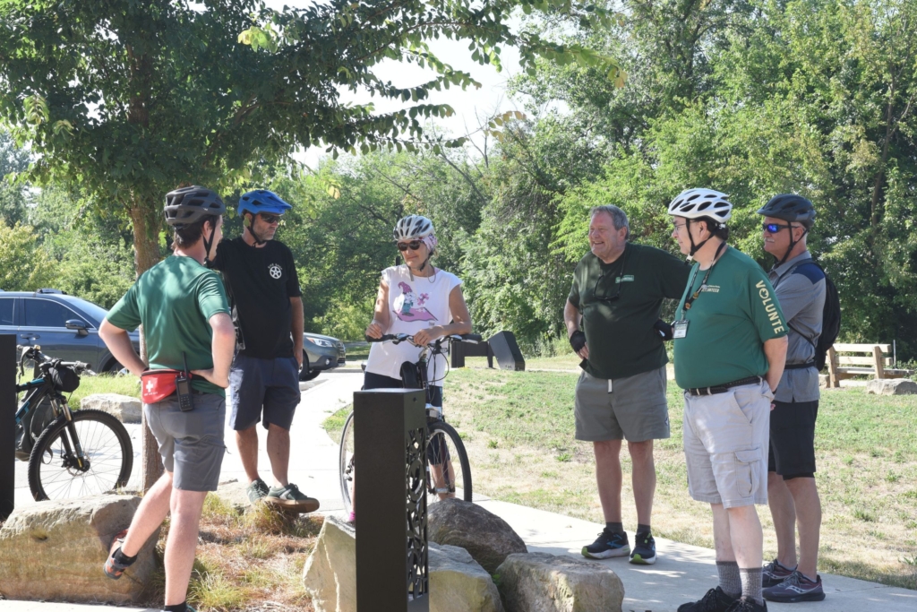 Chris Usner from South Street Ministries Bike Shop, Summit Metro Parks volunteers and more gather for a biking program