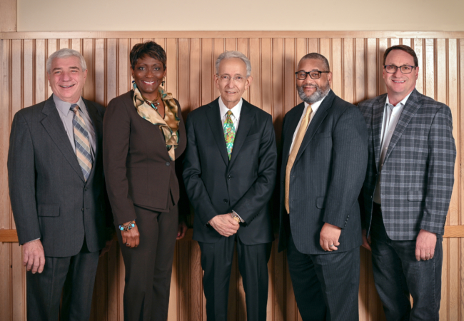 A portrait of the five-person Board of Park Commissioners.