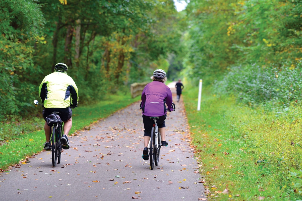 Two bicyclists traveling along Freedom Trail in October 2019
