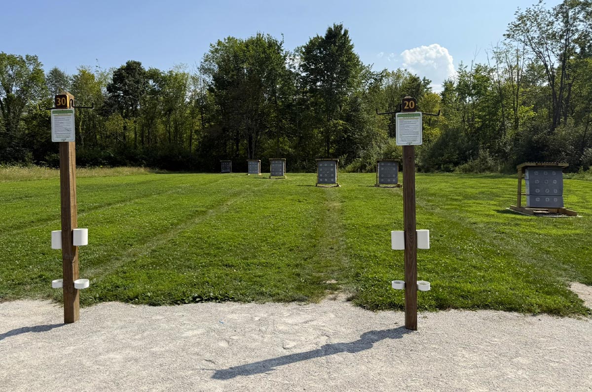 Archery targets set in a field.
