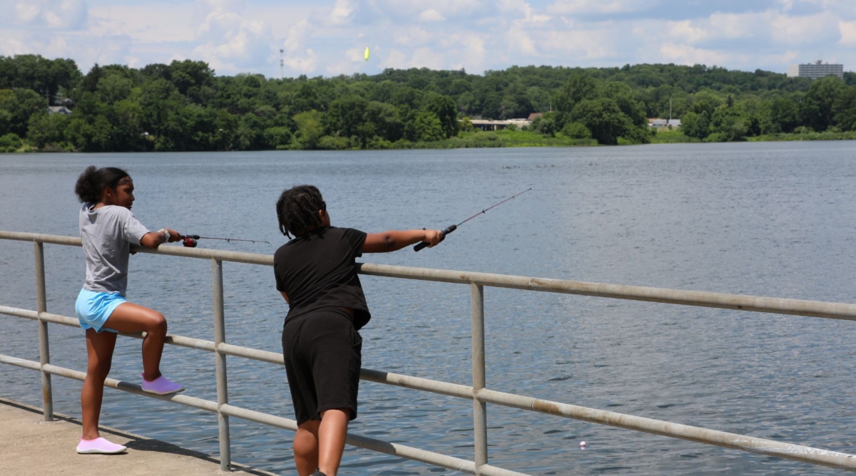 kids fishing from the dock at Summit Lake