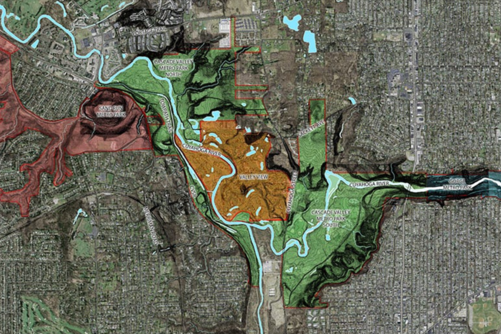 An aerial map outlines areas of Cascade Valley Metro Park that will now be linked with the addition of Valley View Area. Sand Run Metro Park and the Towpath Trail, the Cuyahoga River are also shown.